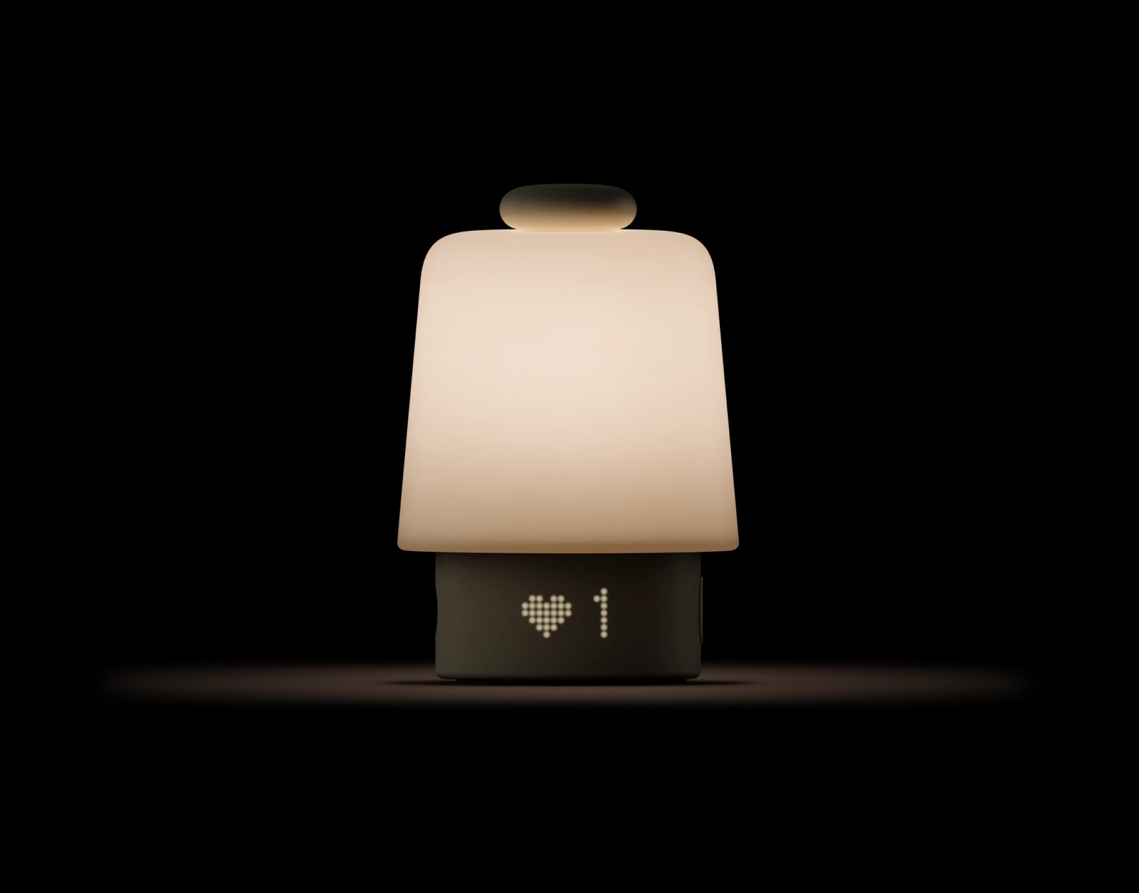 Lit up Hatch Baby on a dark background
